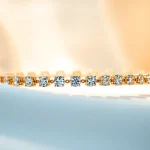 Admire the stunning diamond by the yard bracelet glimmering gracefully on a soft background.